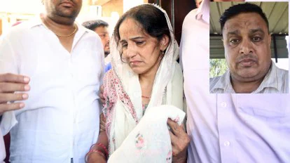 ASI-Sandeep-Kumar-above-his-wife-Santosh